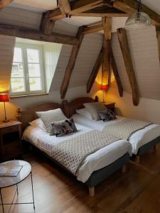 Postel nebo postele na pokoji v ubytování Domaine du Vidal + 29 fotografií