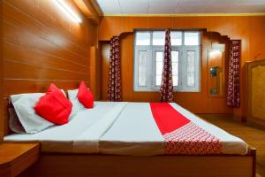 Postel nebo postele na pokoji v ubytování Hotel O Unique