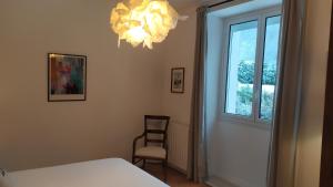 Posteľ alebo postele v izbe v ubytovaní Gîte le Marmare