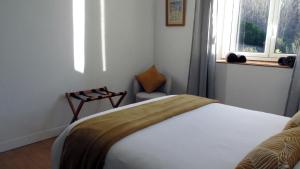 Posteľ alebo postele v izbe v ubytovaní Gîte le Marmare