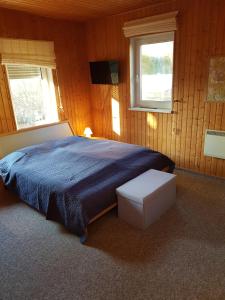 Ένα ή περισσότερα κρεβάτια σε δωμάτιο στο Ferienhaus Hankehübel