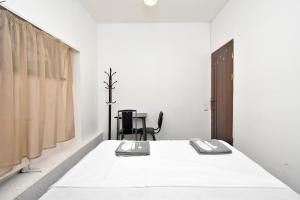 Postel nebo postele na pokoji v ubytování A&S hotel