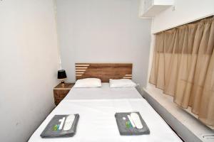 Postel nebo postele na pokoji v ubytování A&S hotel