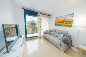 TV a/nebo společenská místnost v ubytování Residencial San Benet 1