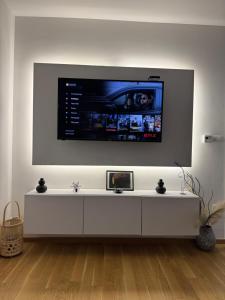 TV a/nebo společenská místnost v ubytování Apartman Daniela
