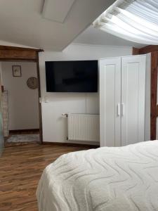 Łóżko lub łóżka w pokoju w obiekcie Orchideen Apartment