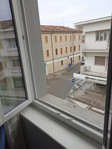 Budova, kde se apartmán nachází + 2 fotografie