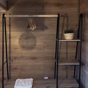 a shelf in a room with a wooden wall at Calera 2 in Burgos +51 photos