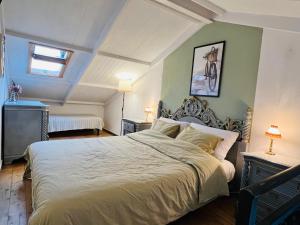 a bedroom with a large bed in a room at BellaLimone in Calatabiano