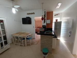 ครัวหรือมุมครัวของ Flat Maresias Beira Mar