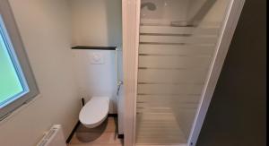 Koupelna v ubytování Tiny House des amis + 12 fotografií