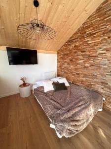 Postel nebo postele na pokoji v ubytování Le Mélèze, chaleureux appartement 4pers près de Genève & Annecy
