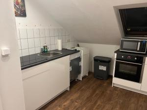 Kuchyň nebo kuchyňský kout v ubytování Ferienzeit 22