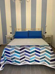 Postel nebo postele na pokoji v ubytování B&B La Milanese
