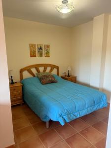 Ένα ή περισσότερα κρεβάτια σε δωμάτιο στο Duplex en Navajas (Castellón)