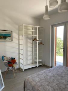 Postel nebo postele na pokoji v ubytování B&B La Milanese