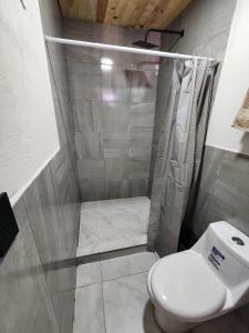 Koupelna v ubytování Hotel Bertis