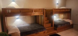 Postel nebo postele na pokoji v ubytování Hotel Bertis