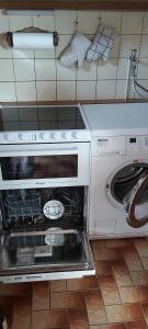 Kuchyň nebo kuchyňský kout v ubytování Ferienhaus Voß