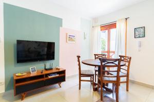 Et tv og/eller underholdning på Lindo Apto no Centro de Santo Antonio do Pinhal/SP