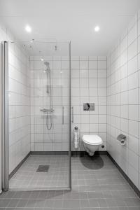 Koupelna v ubytování The Arctic Edge - Modern Seaside Apartment with Host in Central Tromsø