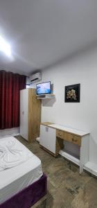 Voodi või voodid majutusasutuse Hotel Kleo toas