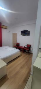Voodi või voodid majutusasutuse Hotel Kleo toas