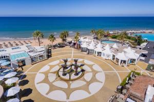 an aerial view of a resort with the beach at Villa V2 VALE DO LOBO BEACH & GOLF in Vale do Lobo