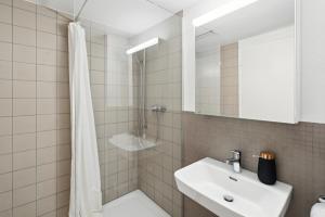 Phòng tắm tại The R Apartment Randen +2 ảnh