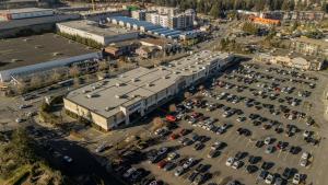 an aerial view of a parking lot with cars at Charming scape by Bear Mountain in Victoria