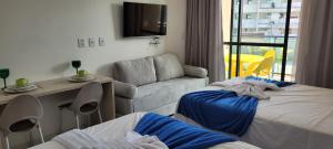 Ένα ή περισσότερα κρεβάτια σε δωμάτιο στο Refúgio By Paty - Malia Beach Studio Porto de Galinhas Muro Alto - Família +59 φωτογραφίες