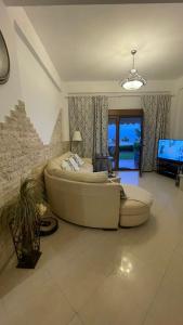 Χώρος καθιστικού στο Lena's House Kriopigi