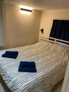 Postel nebo postele na pokoji v ubytování Maison des Dunes