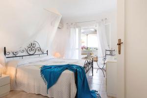 Ένα ή περισσότερα κρεβάτια σε δωμάτιο στο casa sul porto