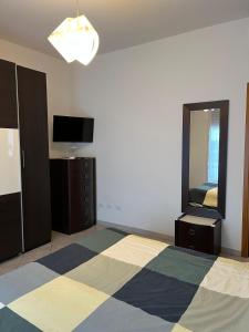 Postel nebo postele na pokoji v ubytování S a f e t y House Treviglio Milano