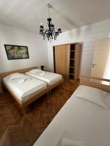 Postel nebo postele na pokoji v ubytování Apartment Abba