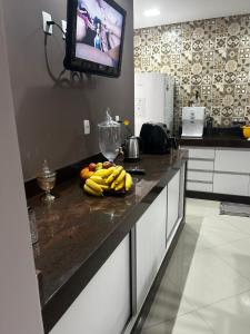 Η κουζίνα ή μικρή κουζίνα στο Apartamento Confortável para até 5 pessoas