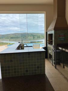 Afbeelding uit fotogalerij van Mansão com vista para lago in Ijaci