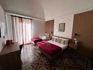 Postel nebo postele na pokoji v ubytování Terra d'amuri Rooms