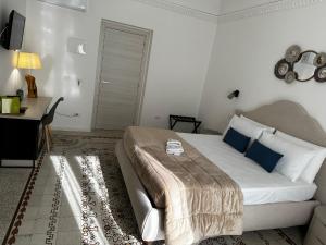 Postel nebo postele na pokoji v ubytování Terra d'amuri Rooms