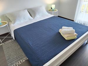 Posteľ alebo postele v izbe v ubytovaní Apartments Mirijana