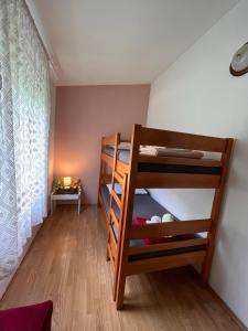 Posteľ alebo postele v izbe v ubytovaní Apartments Mirijana
