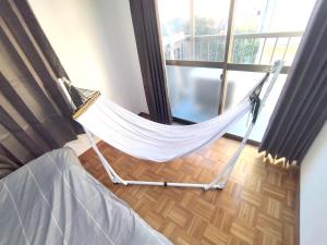 Postel nebo postele na pokoji v ubytování ビーチまで徒歩5分 BBQ無料 7名迄OK 戸建て貸切宿 Bignet villa