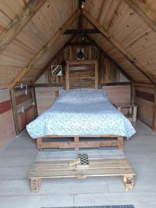Postel nebo postele na pokoji v ubytování Mini Cabaña Roca Glamping