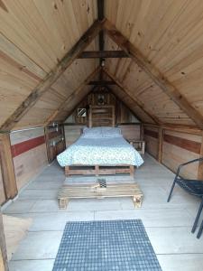 Postel nebo postele na pokoji v ubytování Mini Cabaña Roca Glamping