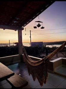 En balkon eller terrasse på Rancho Tertúlia Lago Corumbá IV