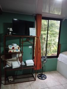 Postel nebo postele na pokoji v ubytování Breezes Ecolodge + 24 fotografií
