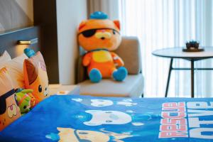Voodi või voodid majutusasutuse JOYA Hangzhou Qianjiang New Town toas