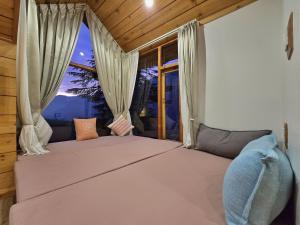 Postel nebo postele na pokoji v ubytování Hygge Home Manali