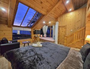 Posezení v ubytování Hygge Home Manali